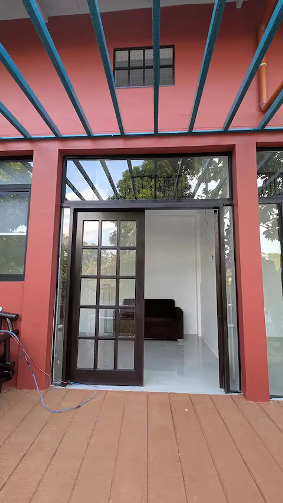 Glass entrance to the Couple's Guest House